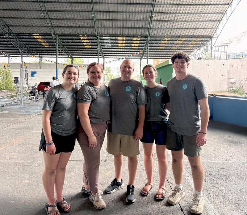 family posing for camera