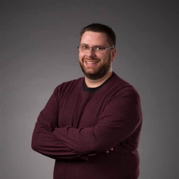 Caleb Stamp posing for a photo